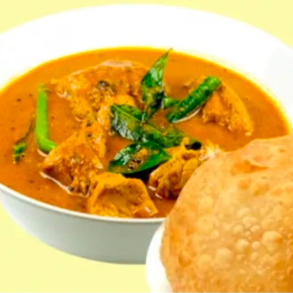 Chai Wyy's Indian curry with chicken, green chilies, and curry leaves, served with puri.